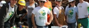 GRID volunteers pose in hard hats