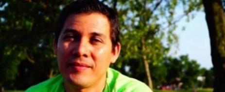 Portrait of Jose Menjivar-Lopez, a young Latino man