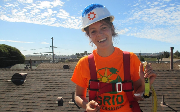 Team Leader Ashley beams from the roof