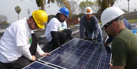 Trainees laying a module