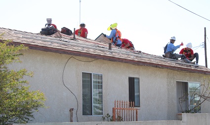 Solarthon workers enjoy themselves on the roof