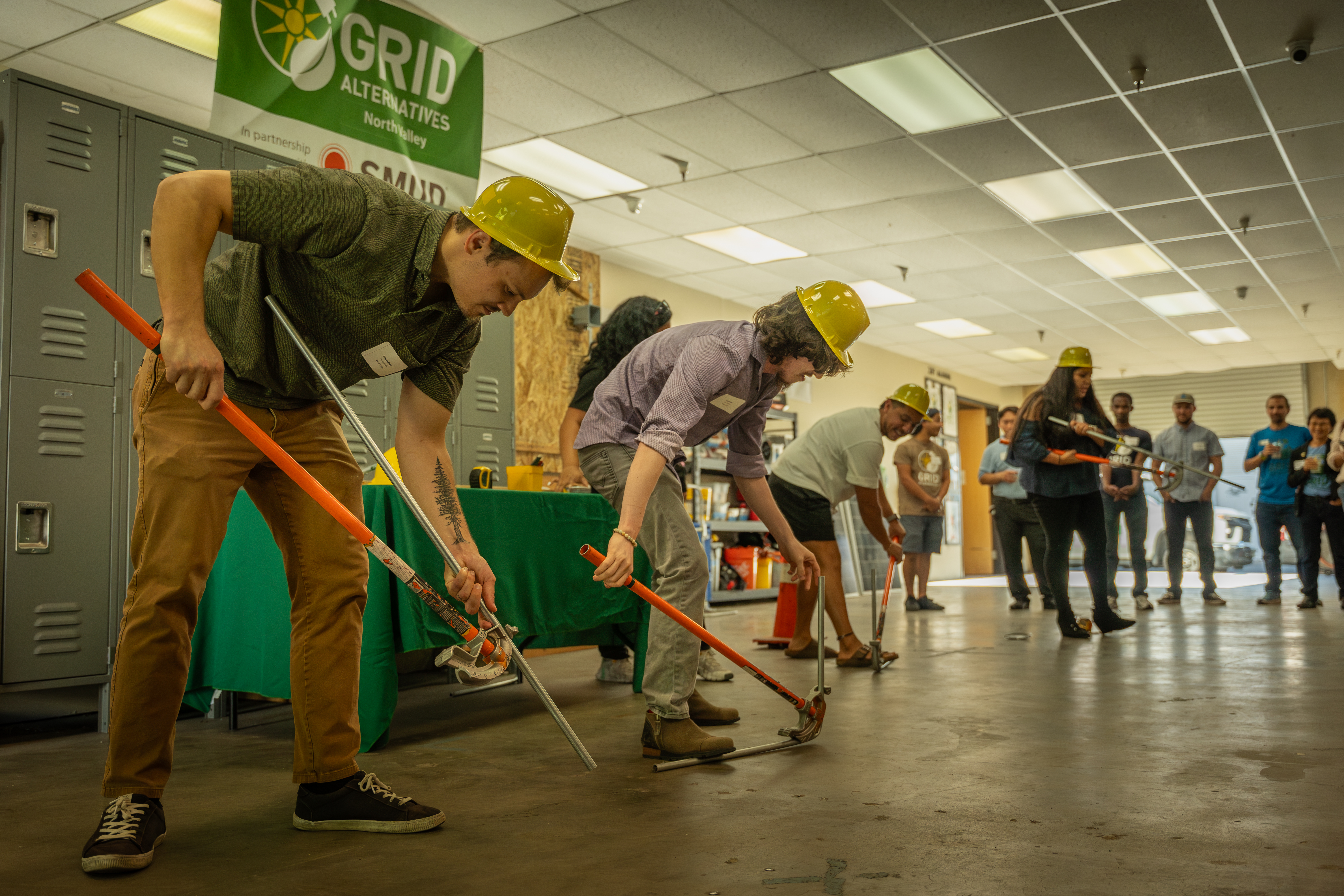 North Valley Open House attendees during a conduit bending workshop.