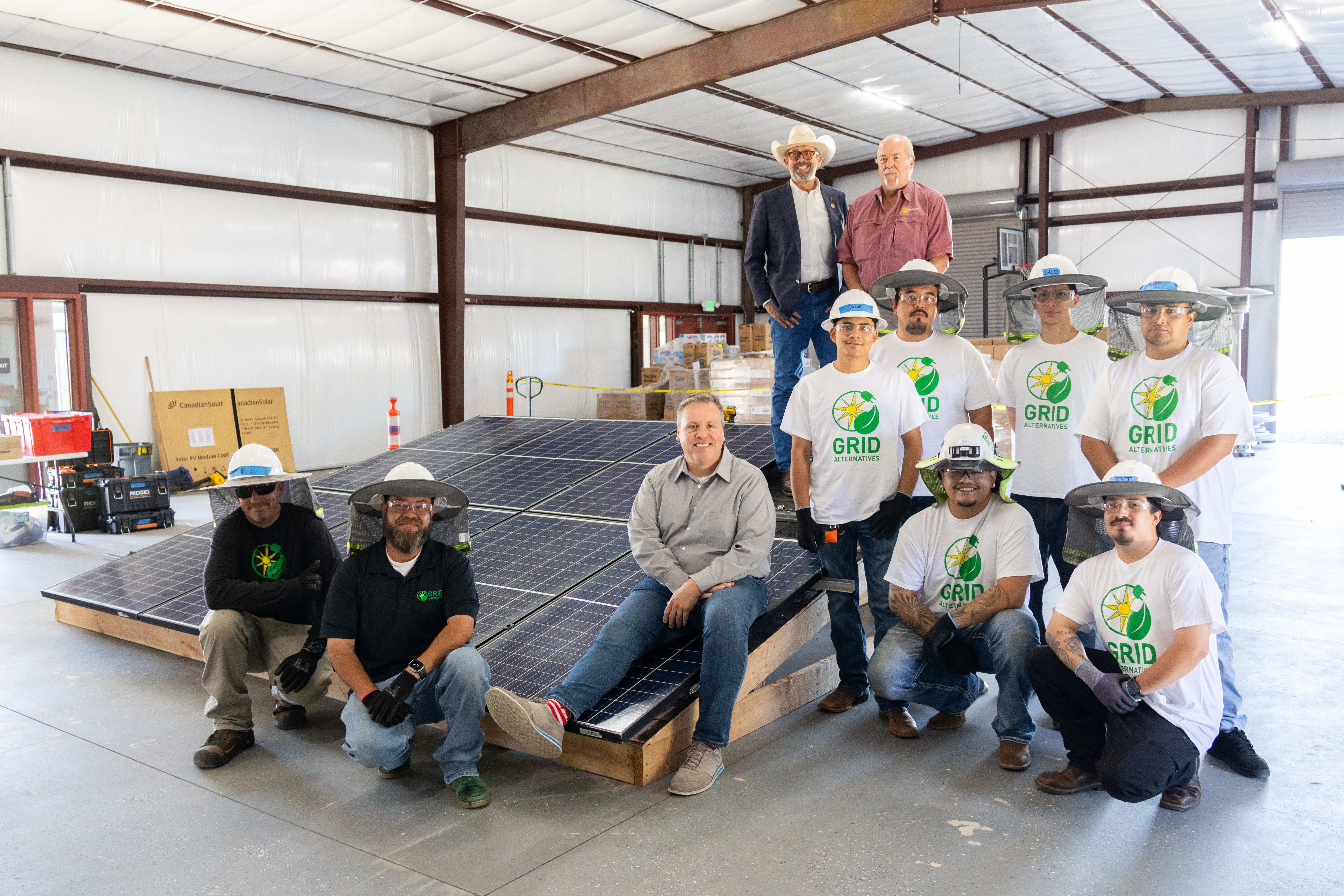 6 trainees from CVOC posing for photos with GRID Staff and partners