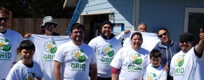 A group of volunteers in GRID t-shirts