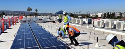 GRID GLA construction staff installs commercial solar 