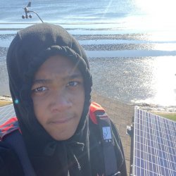 Solar Works DC trainee Jahlil Wormley working at his new job at Tesla Energy