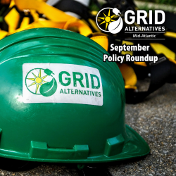 A green hard hat with GRID Mid-Atlantic's logo on the side 