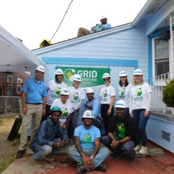 GRID Alternatives Bay Area construction team posing next to BMO[Bank of Montreal] volunteers