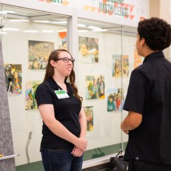 Jackie Brown speaking to a high school student