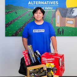 man posing for photo with tools 