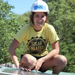 Ashley Gremel on a rooftop with solar in Esteli, Nicaragua.