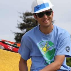 Wyatt Atkinson smiles while at an GRID install