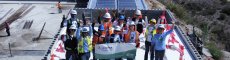 Renewable energy students from Tijuana on the roof with solar system