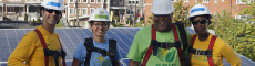 Members of job training partner SolarWorks DC with GRID staff member and client