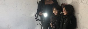 Children in Nicaragua react to a glowing lightbulb