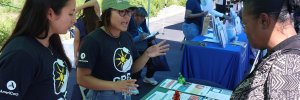 sophia speaking to a community member