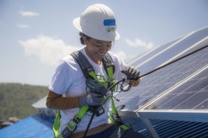 Nepali volunteer solar installer