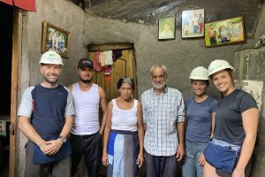 Solar home system family and traveler volunteers