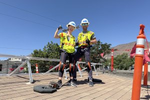 International Volunteers Installing on Roof