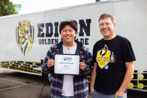 Welson Vue posing for photo with teacher