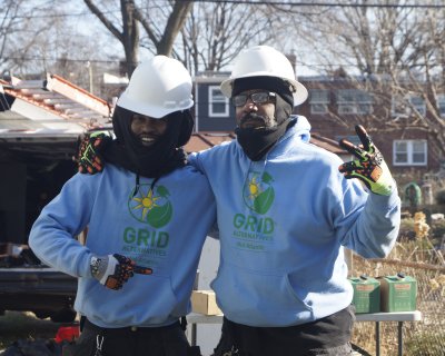 Tyjuan and Damon pose for a picture during an install in December 2022 in Washington DC. 
