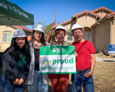 GRID IE's Alejandra Guillen-Garcia (Outreach Coordinator), Yoselyn Sanchez (Outreach Manager), with Patrica and Steven Chung (Homeowners) on the day of their solar installation.