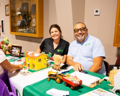 two staff members tabling at an event
