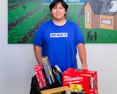 man posing for photo with tools 