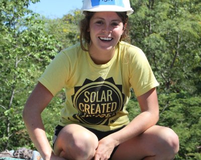 Ashley Gremel on a rooftop with solar in Esteli, Nicaragua.