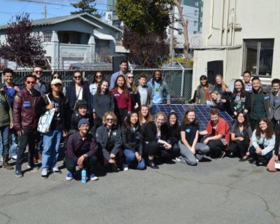 Environmental and social justice fellows from around the Bay Area pose with UC Berkeley students at Fellowship Summit in Oakland, California.