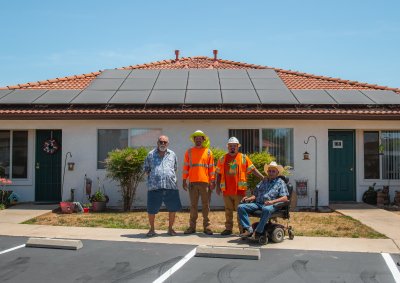 Grid staff and two las brisas residents 