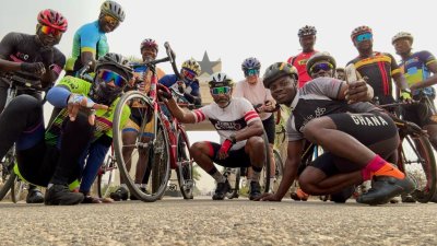 GRID Mid-Atlantic Logistics and Facilities Manager Sundiata Ramin (center) rides with the Gladiators cycling group while visiting Ghana in January 2024.