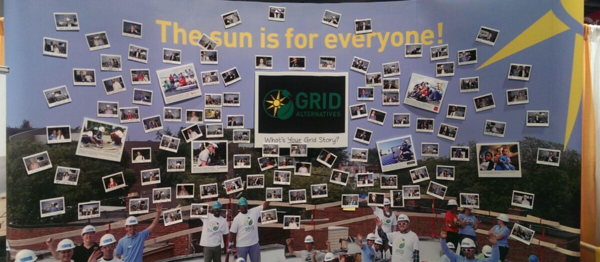 Grid Alternatives community solar mural with "The sun is for everyone" text and photo collage of diverse participants
