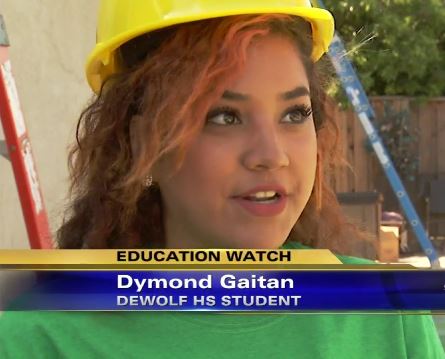 Dymond Gaitan, DeWolf HS student, wearing yellow hard hat during Education Watch segment