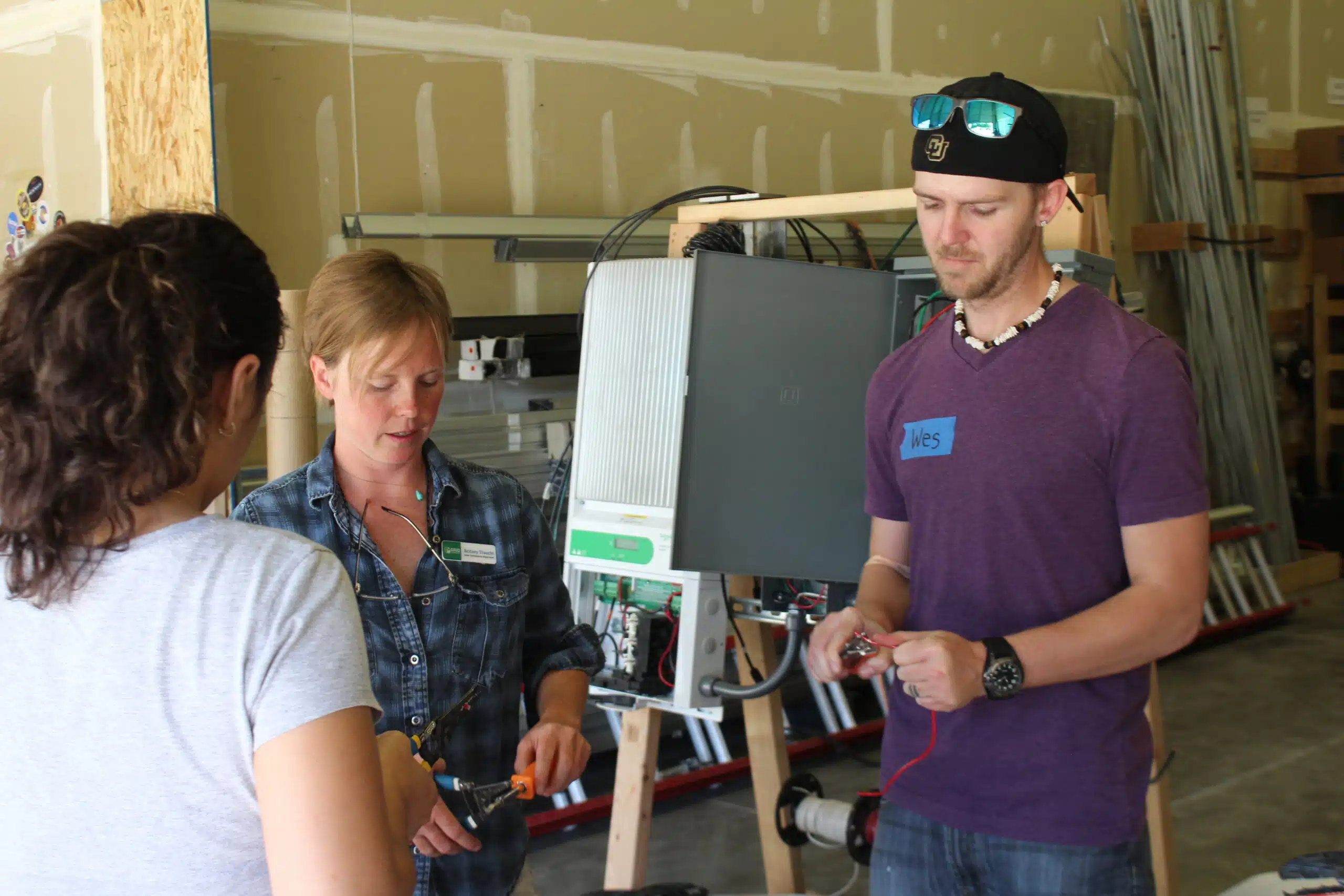 Wes (right) practices wire management