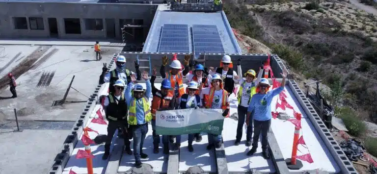Renewable energy students from Tijuana on the roof with solar system