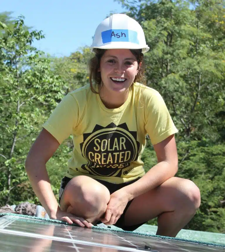 Ashley Gremel on a rooftop with solar in Esteli, Nicaragua.