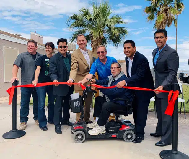 Group of eight people at ribbon-cutting ceremony for Chemehuevi accessibility project
