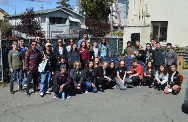 Environmental and social justice fellows from around the Bay Area pose with UC Berkeley students at Fellowship Summit in Oakland, California.