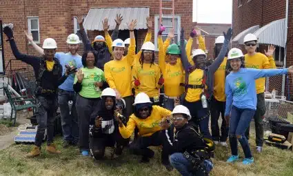 The Solar Works DC trainees pose at an install