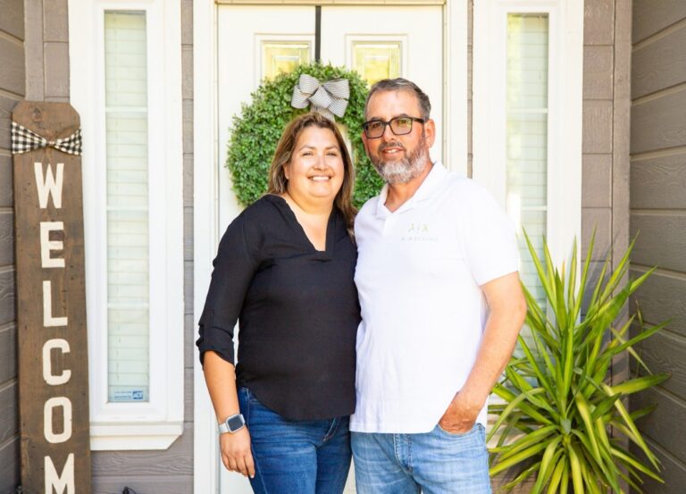 Hilda and Rafael Barragan welcoming people at their front door.