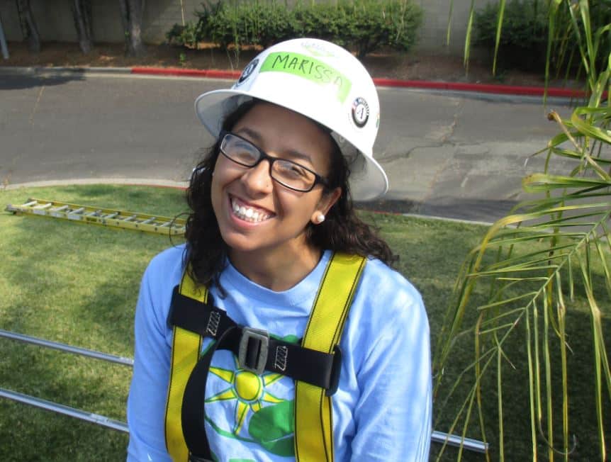 Marissa Leshnov smiles while on a GRID install in Pittsburg, California.