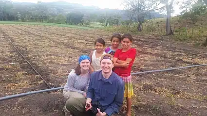 Fellow participants Mike & Emily with children from the La Rinconada community.