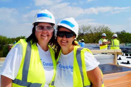 Two Constellation volunteers pose for the camera