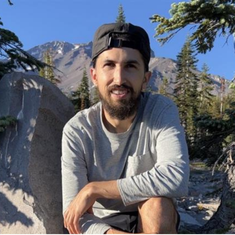 michael sanchez posing outdoors