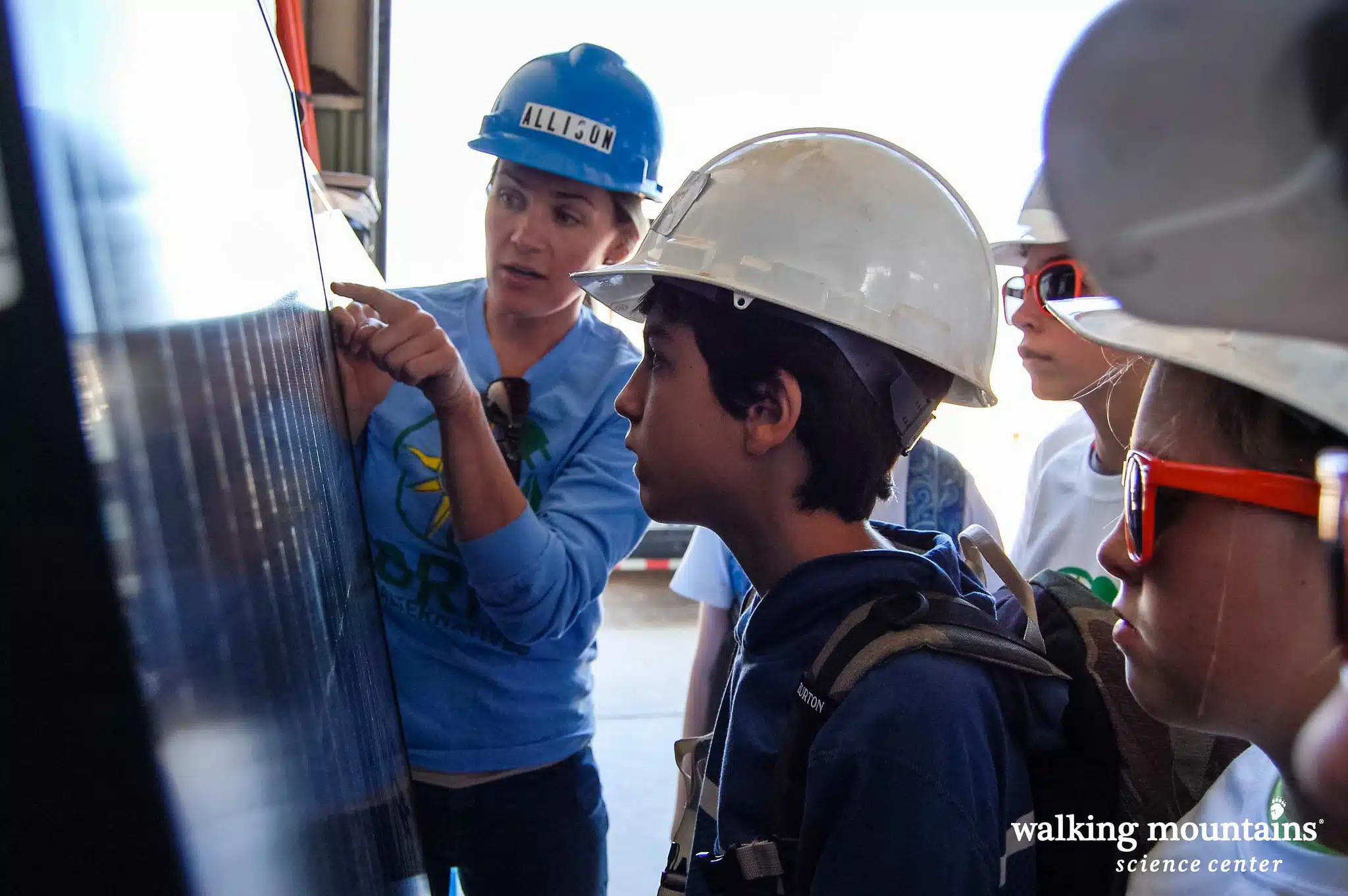 Walking Mountain students with solar panels