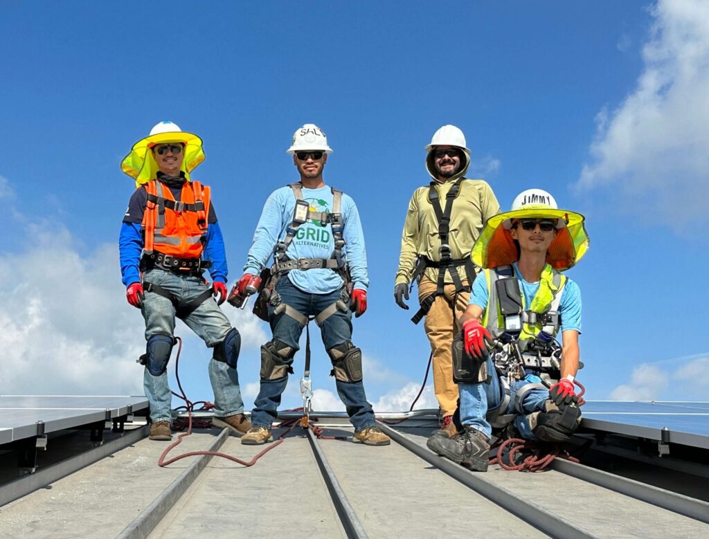 People standing and posing on roof