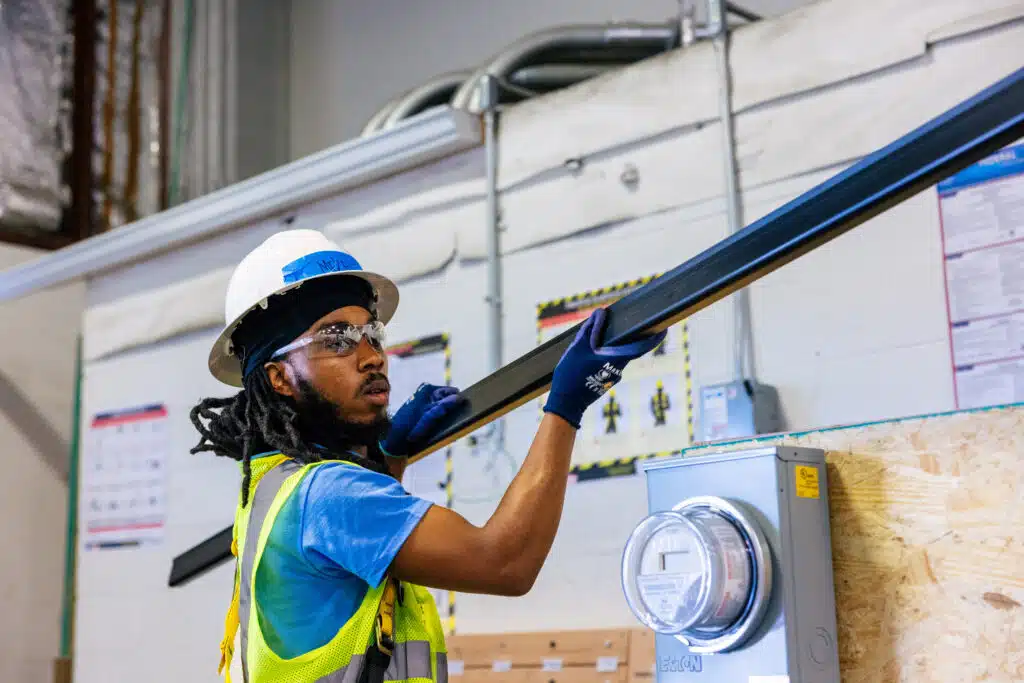 IBT trainee carrying equipment