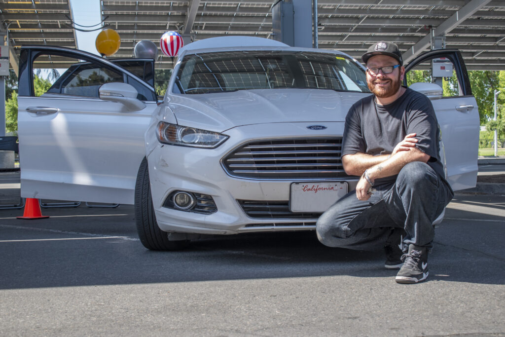 man with car