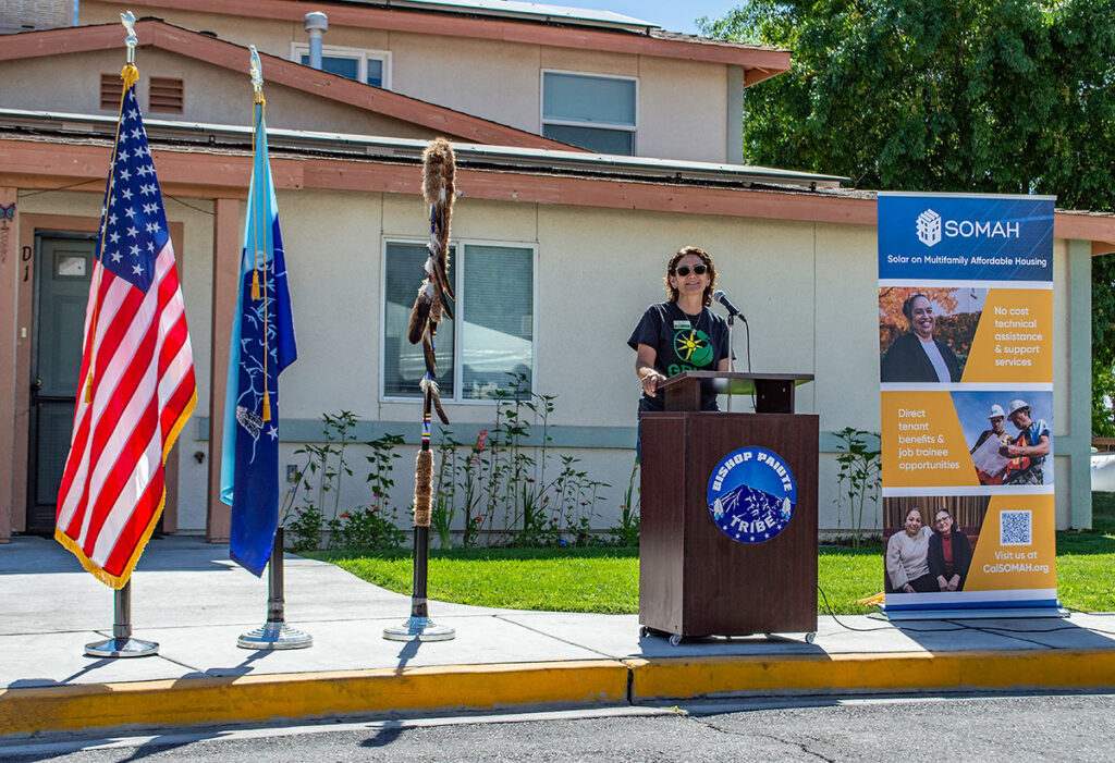 Lisa Castilone (GRID IE Community Development & Tribal Program Manager), speaking at the ribbon-cutting